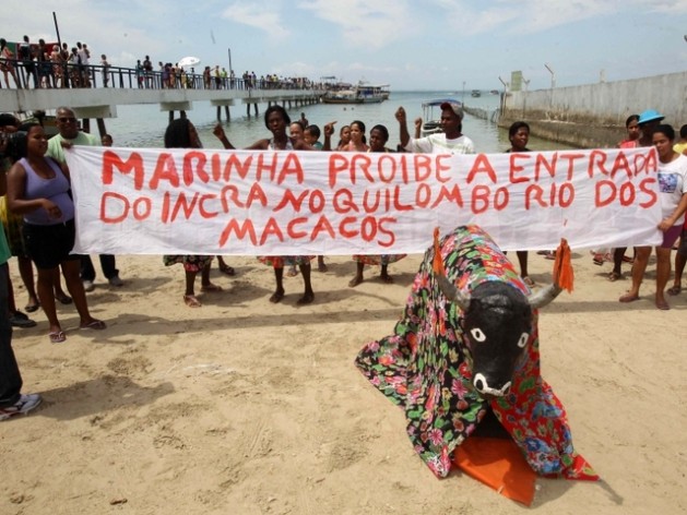 A protest by the residents of Rio dos Macacos against the occupation of their land and violations of their rights by the Aratu naval base. Credit: Coha.org