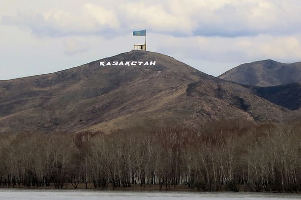 On a hill overlooking the northeastern Kazakh city of Oskemen, bright white letters spell out Ã¢Â€Â˜KazakhstanÃ¢Â€Â™ under a large Kazakh flag in early April 2014. Oskemen - known in Russian as Ust-Kamenogorsk - is a Russian-majority city, where 67 percent of inhabitants are ethnic Russian, triple the national ratio in Kazakhstan. Credit: Joanna Lillis/EurasiaNet