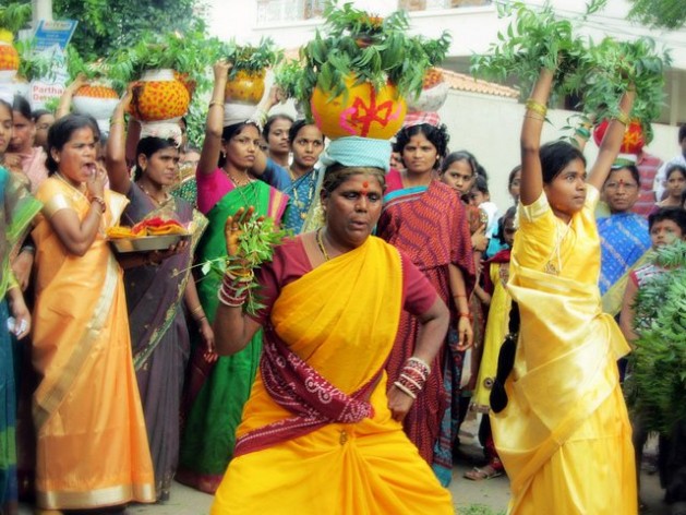 Joginis dance outside a temple during a religious festival. Credit: Stella Paul/IPS