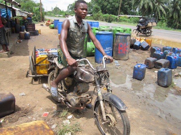 David, 14, transports gallons of palm oil for his father in Penja, in CameroonÃ¢Â€Â™s Littoral region. Experts say there is a strong need for a people-centred approach if growth in Cameroon is to be resilient. Credit: Monde Kingsley Nfor/IPS