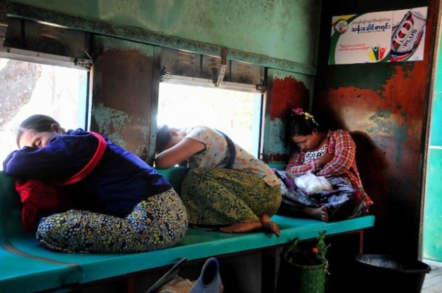 Women sleep on a crowded train in Myanmar. Globally, some 1.2 billion people live on less than 1.25 dollars a day. Credit: Amantha Perera/IPS