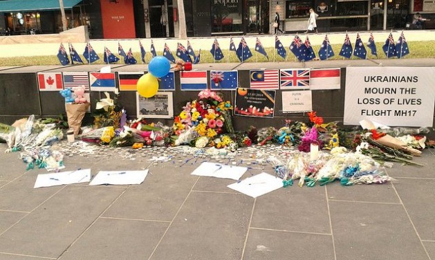 Messages of sympathy adorn a street in Melbourne. Credit: Diana G Mendoza/IPS