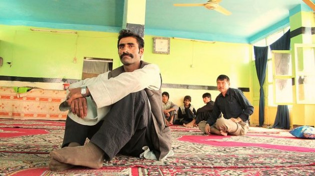Afghan migrants wait patiently for the smugglers who will take them to Iran. Credit: Karlos Zurutuza/IPS
