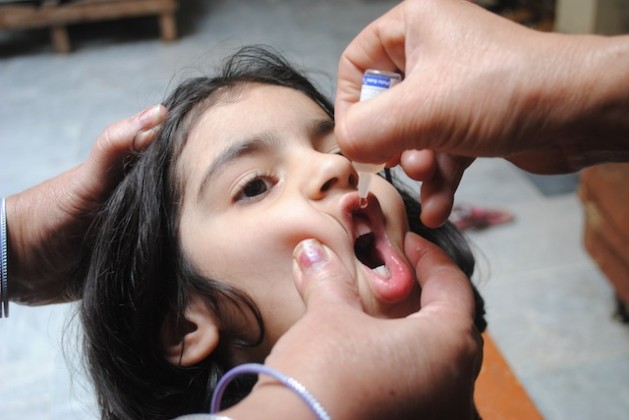 A Pakistani child receives a dose of the oral polio vaccine (OPV). According to the WHO, Pakistan is responsible for 80 percent of polio cases worldwide. Credit: Ashfaq Yusufzai/IPS