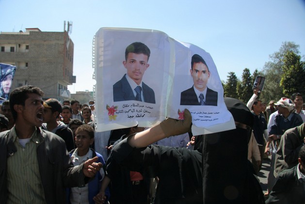Yemeni protesters in Sanaa carrying pictures of arrested men. Credit: Yazeed Kamaldien/IPS