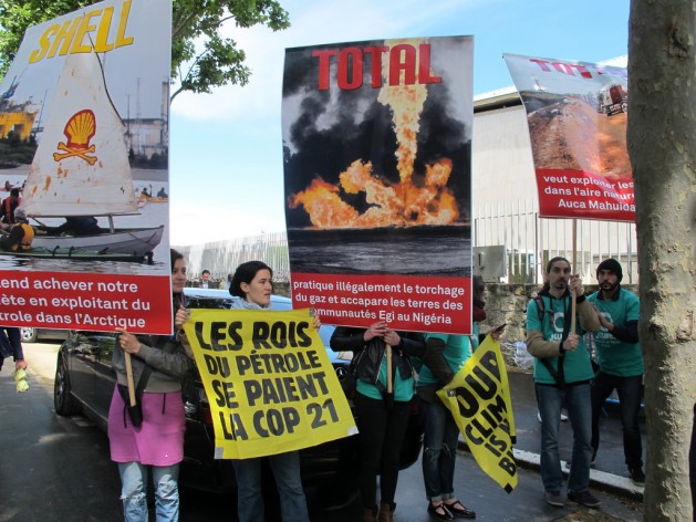 Demonstrators protesting at the Business & Climate Summit in Paris, May 20. Credit: A.D. McKenzie/IPS