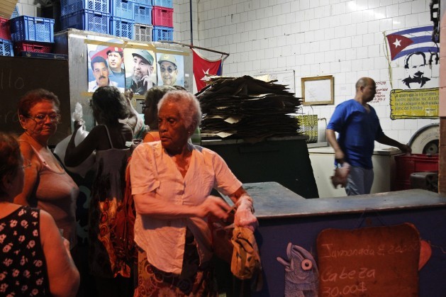 A group of women wait their turn to buy rationed food that is sold at subsidised prices, at a government shop in Havana, Cuba on Nov. 21, 2015. Credit: Jorge Luis Baños/IPS