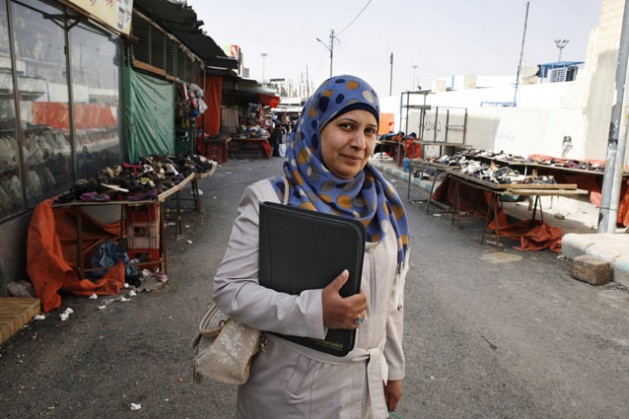 Syrian refugee Emelline Mahmoud Ilyas stands outside the UNRWA community centre in Zarqa. Jordan 2015. Credit: Silvia Boarini/IPS