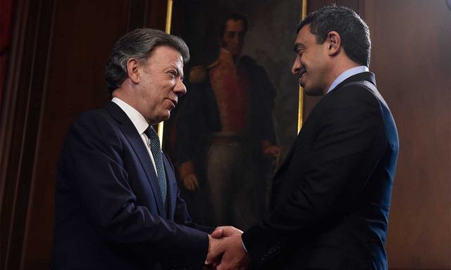  Colombian President Juan Manuel Santos greets the foreign minister of the United Arab Emirates, Abdullah bin Zayed al Nahyan, in the Casa de Nariño, the seat of the presidency, at the start of their Feb. 9 meeting in Bogotá during the Emirati minister’s visit to this South American country. Credit: Presidency of Colombia