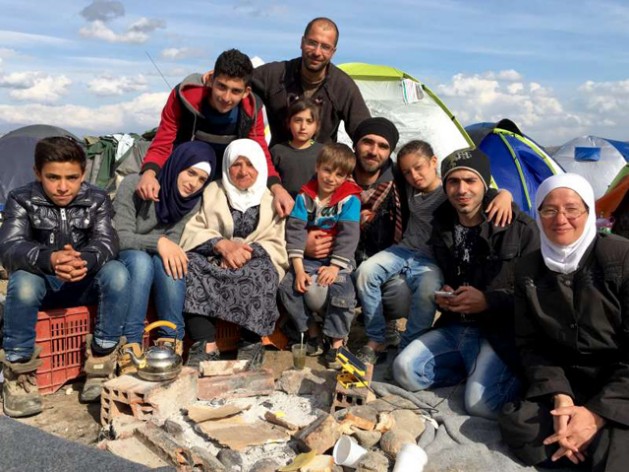A group of seven Syrian refugee families, once strangers, arrived on the Greek islands together and are still together. Credit: T.Karas/UNHCR