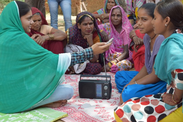 A journalist from Radio Bundelkhand in India conducts an interview. Credit: Stella Paul/IPS