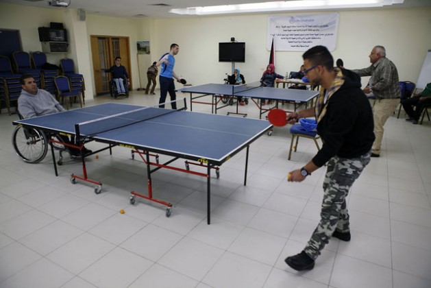 Table tennis players train at Majd Sports. Majd Sports is a recreational centre catering for people with disabilities in Ramallah, occupied West Bank.  Credit: Silvia Boarini/IPS