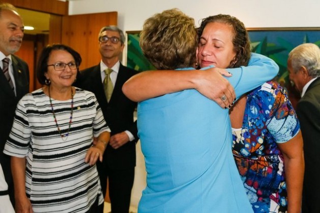 Brazilian President Dilma Rousseff, her back to the camera, receives a hug on Monday Apr. 18 by one of the minority of lower house legislators who voted against her impeachment the day before. Credit: Roberto Stuckert/PR