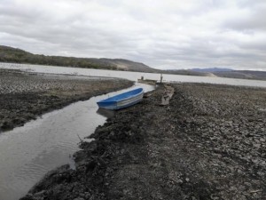 Boats stranded on the dry bed of Moyúa lake in northern Nicaragua, which has lost 60 percent of its water due to the severe drought plaguing the country since 2014. Credit: Courtesy of Rezayé Álvarez