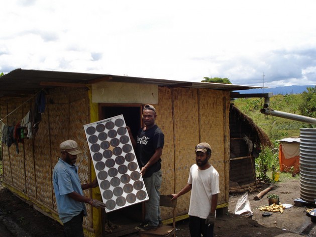 Communities in rural Papua New Guinea install their own cost effective and energy efficient solar panels. Credit: Catherine Wilson/IPS