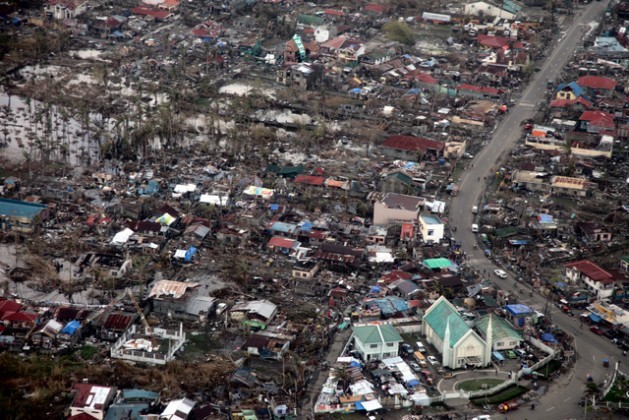 Tacloban, in the Philippines, one of the areas hit hardest by super typhoon Haiyan in November 2013. The disaster coincided with the COP19 climate talks and served as the backdrop for negotiations on mechanisms of damage and losses. Credit: Russell Watkins/Department for International Development