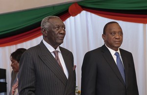 Former Ghanaian President John Kufor and Kenya's President Uhuru Kenyatta.