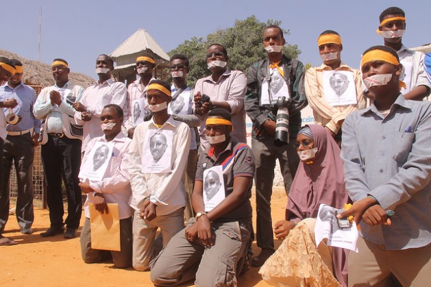 Somali Journalists protesting in 2013 after their colleague Abdiaziz Abdinur Ibrahim was arrested for the story of a woman who alleged that she was gang raped by Somali government forces. Credit: Abdurrahman Warsameh/IPS