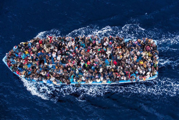 Hundreds of refugees and migrants aboard a fishing boat moments before being rescued by the Italian Navy as part of their Mare Nostrum operation in June 2014. Photo: The Italian Coastguard/Massimo Sestini | Source: UN News Centre