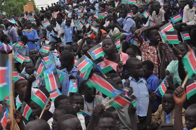 Pictured here children celebrate South Sudan’s second birthday in July 2013 in Juba. Credit: Charlton Doki/IPS