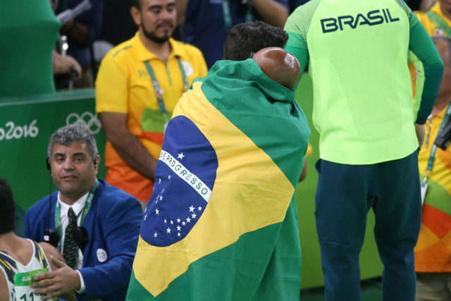 Judoka Rafaela Silva, who won Brazil’s first medal – gold - on Aug. 8, had received racial slurs like “monkey that should be in a cage” when she was disqualified from the London 2012 Games; now she is fa heroine. Credit: Roberto Castro/Brasil2016