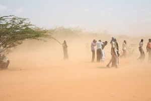 Famine refugees in East Africa are caught in a dust storm. Photo credit: flickr/Oxfam International