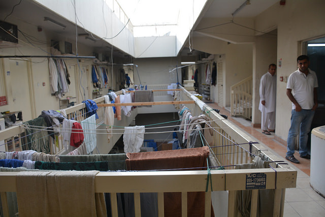 A labour camp in Dubai. Workers are allocated sleeping quarters based on nationality, and the number of occupants may be to six to eight per room. Credit: S. Irfan Ahmed/IPS