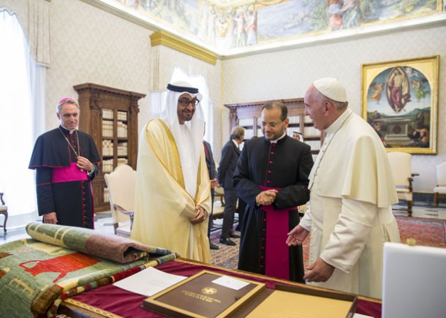 Sheikh Mohamed bin Zayed and Pope Francis exchange gifts in the papal library at the apostolic palace. Credit: WAM
