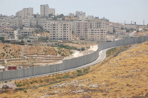 The Shuafat refugee camp can be seen across the separation wall from the Israeli settlement Pisgat Ze'ev. Credit: Jillian Kestler-D’Amours/IPS.