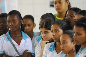 Students watch a performance by their peers at Barros Barreto School, in Salvador, Brazil. The performance tackled social issues such as racism and gender discrimination. Credit: UNICEF/Claudio Versiani