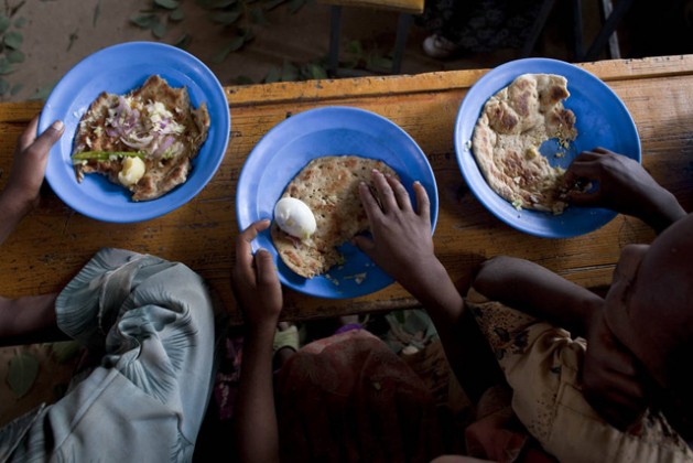 Every day around 370 million children around the world are fed at school through school meals programmes. Credit: FAO