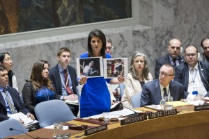 Nikki Haley, U.S. Permanent Representative to the UN holding up pictures of victims of the alleged chemical weapons attack in Syria which prompted the Trump administration to launch an airstrike against the Assad government. Credit: UN Photo/Rick Bajornas