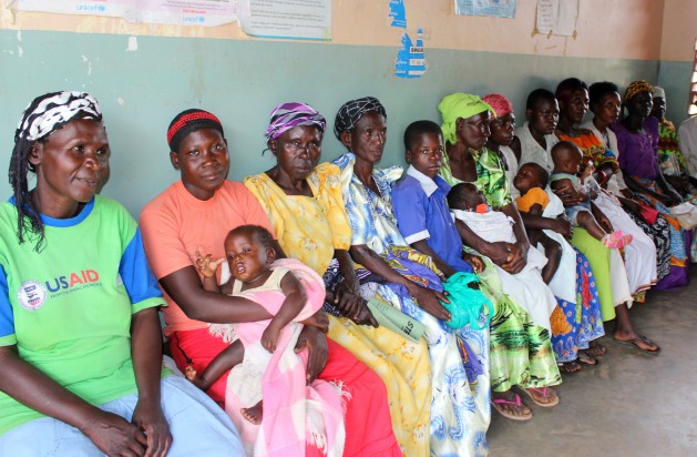 Mothers and babies wait for health screening at a US funded health clinic in Uganda. Credit: Lyndal Rowlands / IPS.