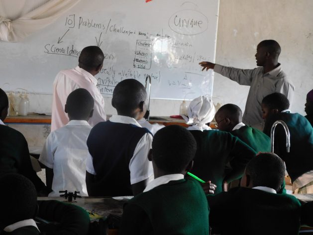 Image result for teachers teaching in Kenya secondary school