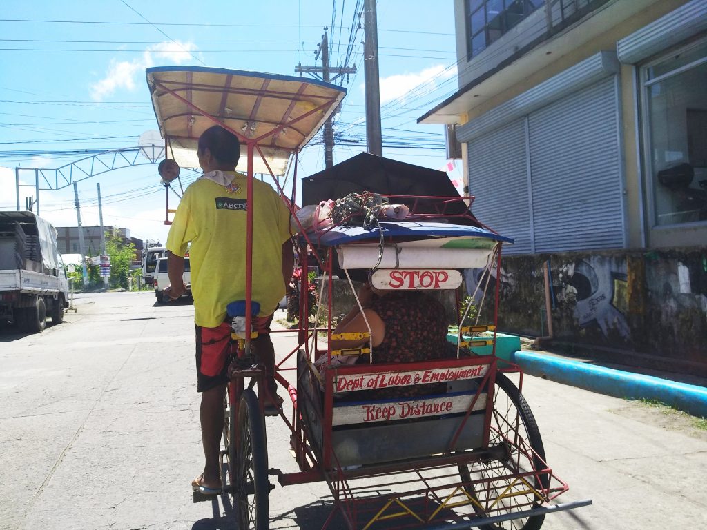 An elderly pedicab driver in Manila. The elderly, especially from poor communities, continue to face multiple vulnerabilities and sustainability challenges in the Philippines, which have increased due to the COVID19 pandemic. Credit: Stella Paul/IPS