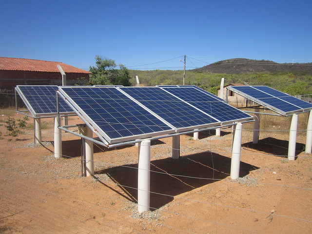 Solar panels generate electricity to pump water to a tank on a neighbouring hill and to supply water by gravity to 120 families in a neighbourhood in Aparecida, a city in the state of Paraíba, in Brazil's semi-arid Northeast. CREDIT: Mario Osava/IPS